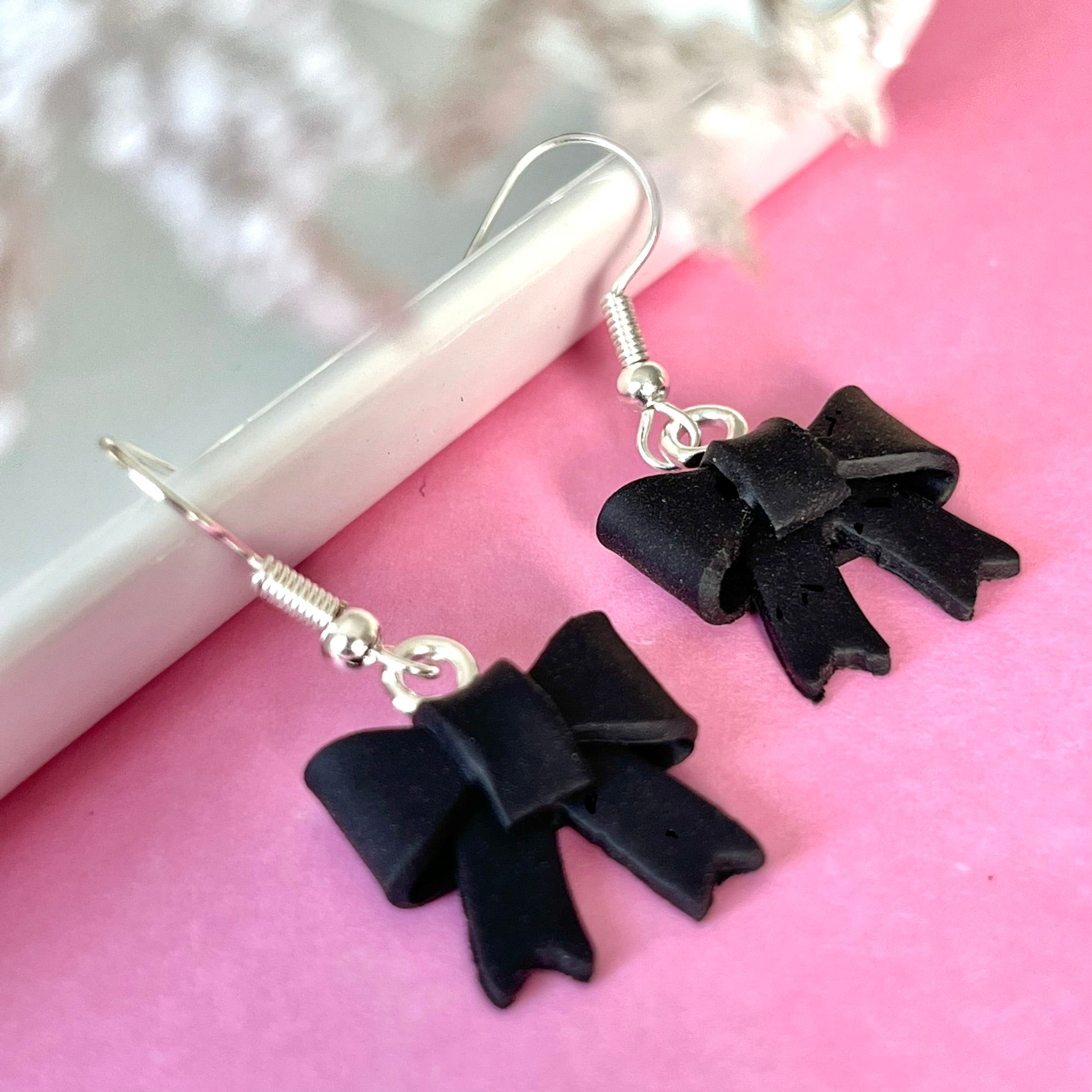 Black bow dangles