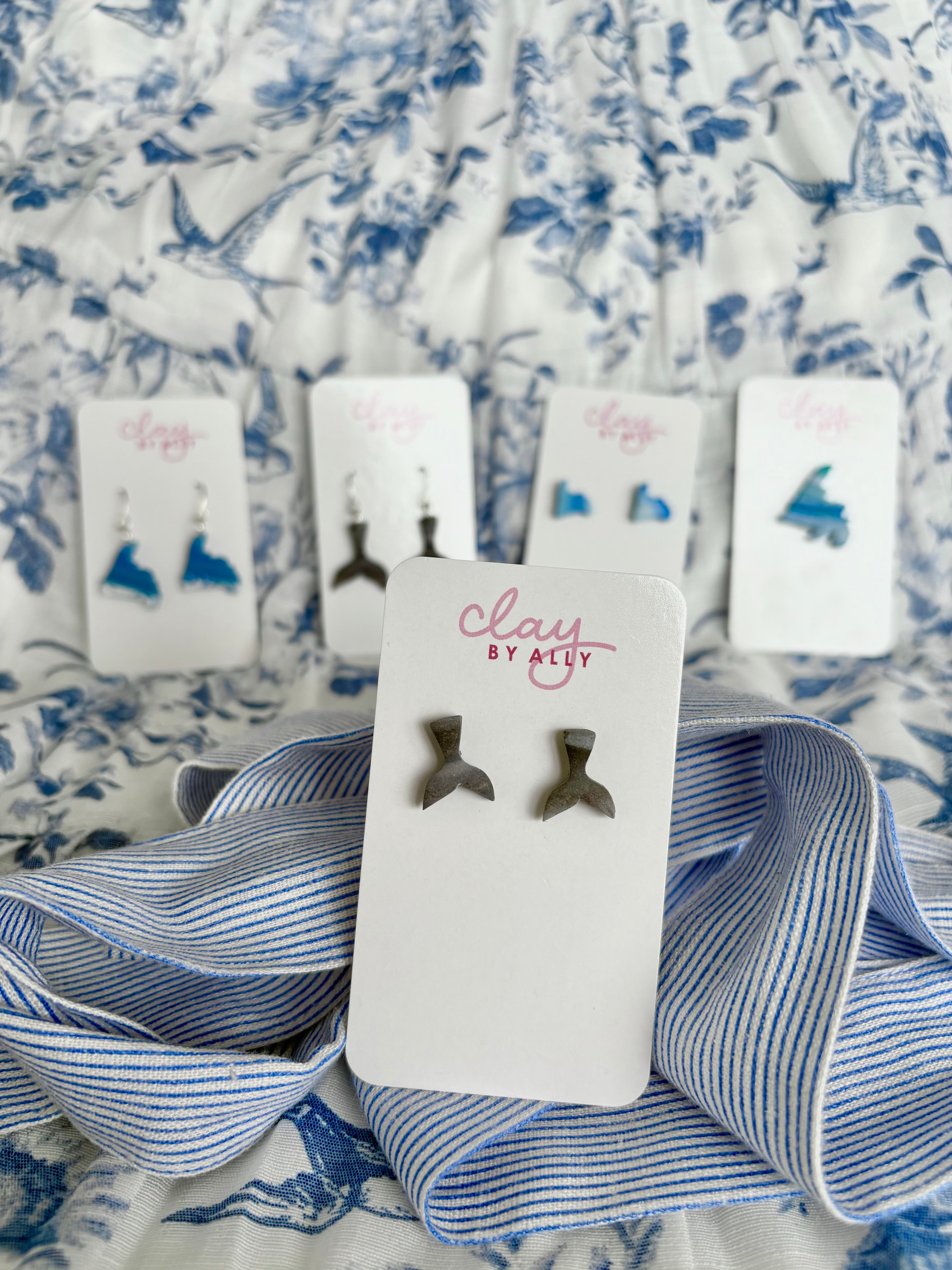 Whale tail studs